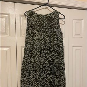 Women’s green cheetah sheath dress.   Stretchy fabric.  Sized to fit like a 14